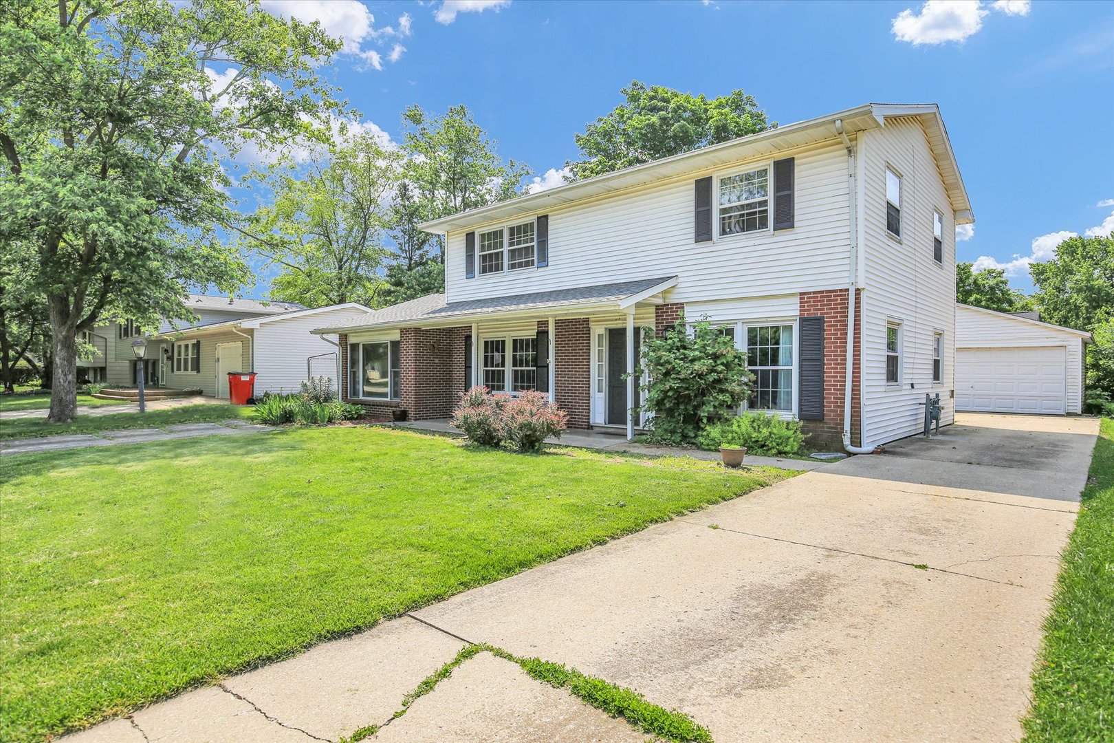 2107 Barberry Drive Champaign, IL 61821 - Photo 31 of 37 a front view of a house with a yard