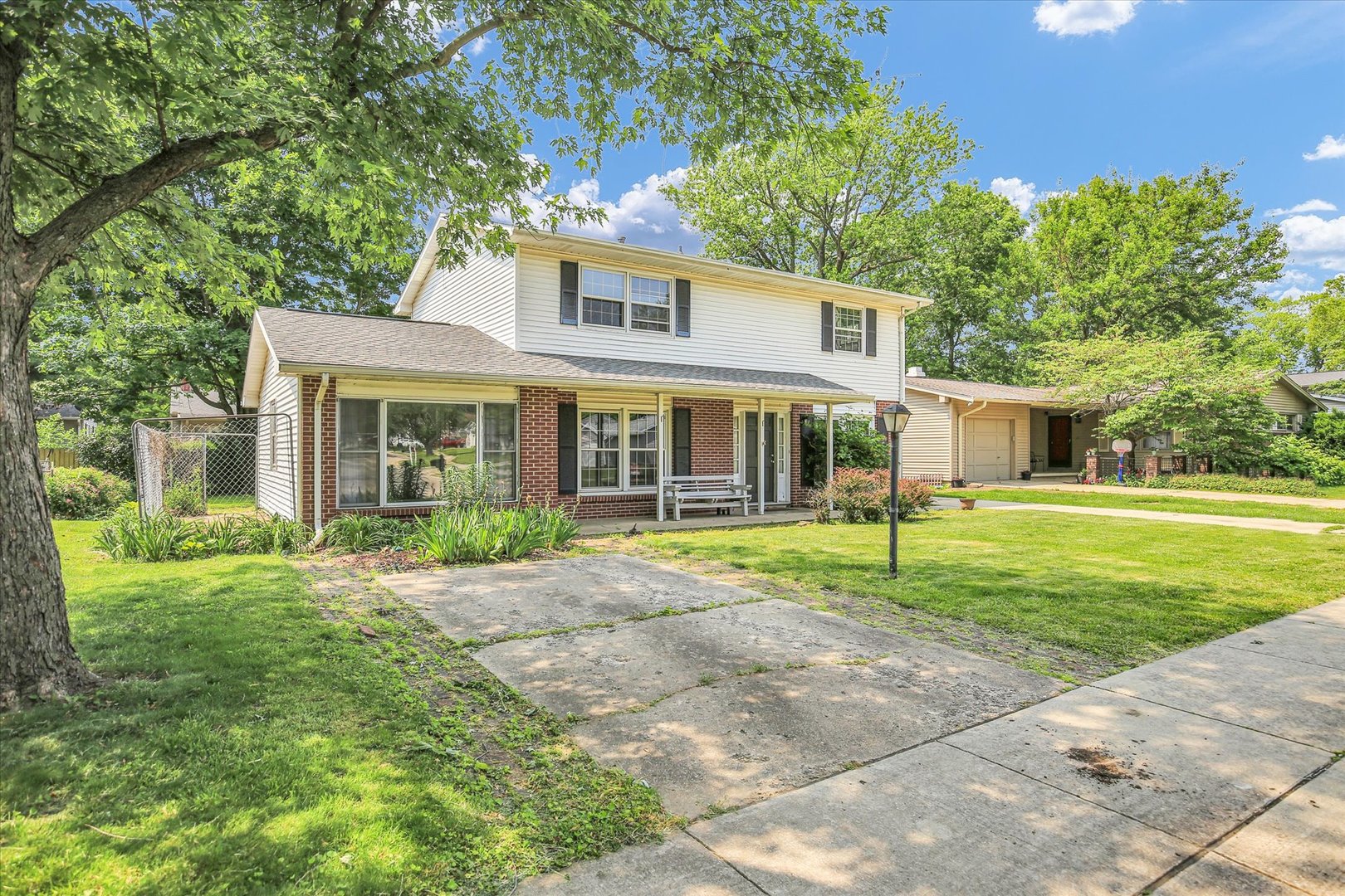 2107 Barberry Drive Champaign, IL 61821 - Photo 32 of 37 front view of a house with a yard