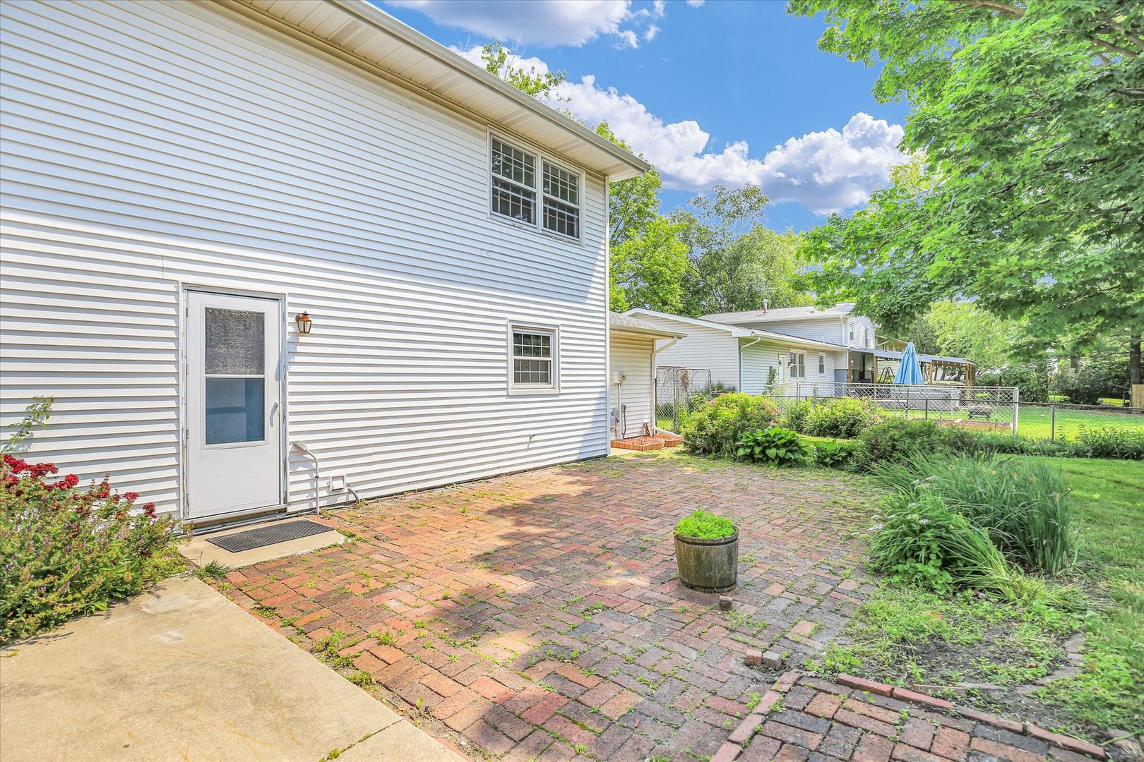 2107 Barberry Drive Champaign, IL 61821 - Photo 34 of 37 a view of a house with backyard and sitting area