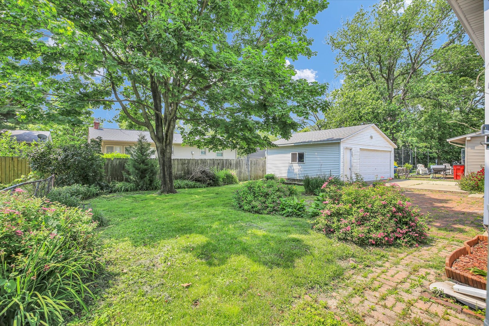 2107 Barberry Drive Champaign, IL 61821 - Photo 36 of 37 a view of a house with backyard and garden