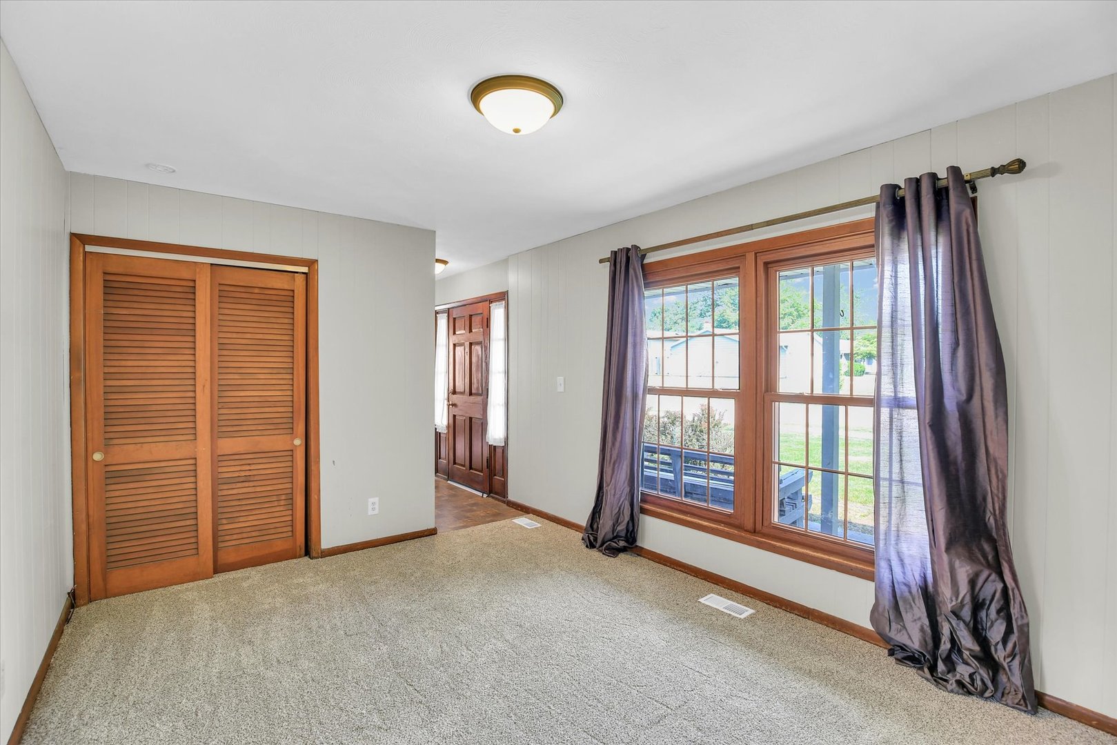 2107 Barberry Drive Champaign, IL 61821 - Photo 5 of 37 a view of an empty room with a window