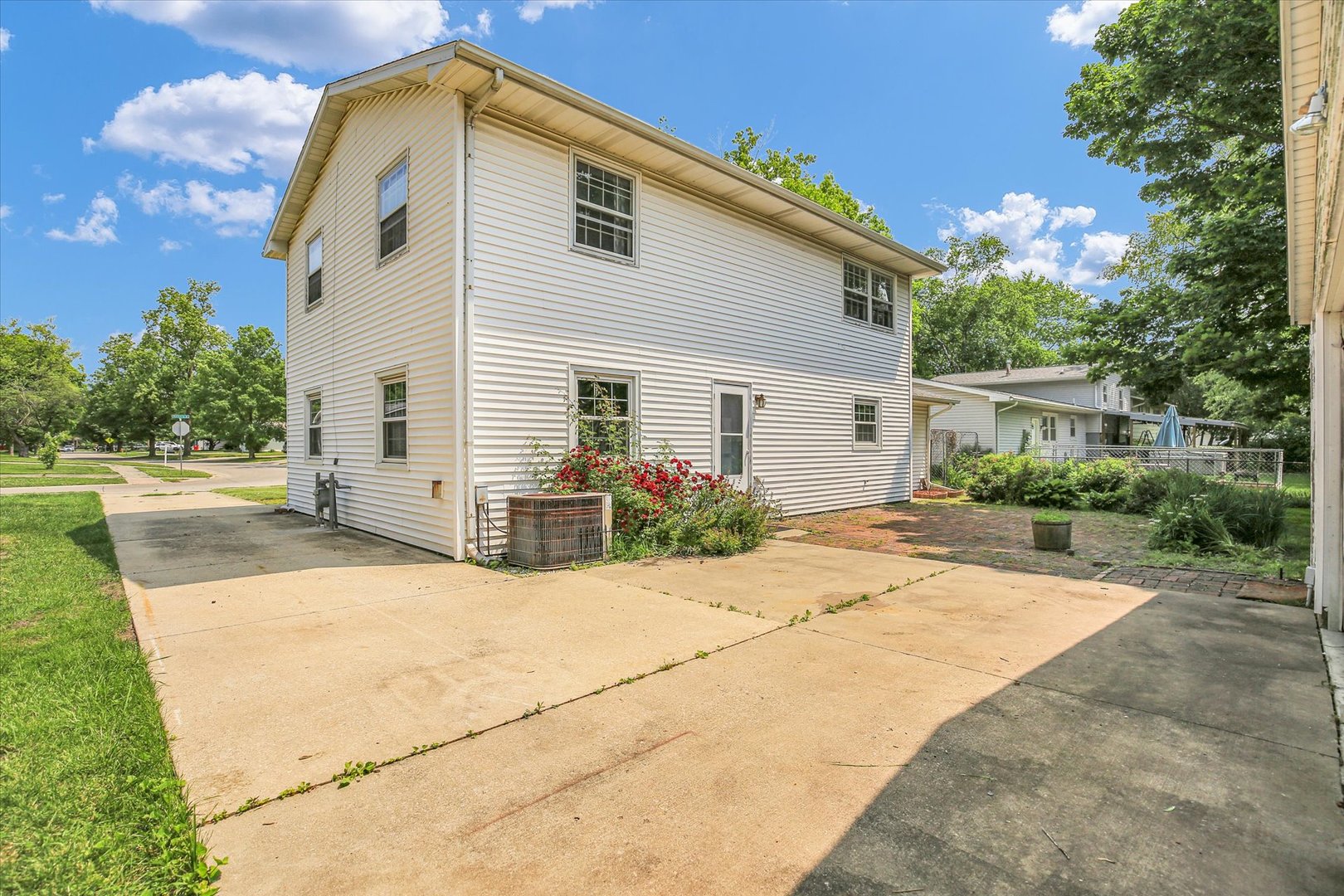 2107 Barberry Drive Champaign, IL 61821 - Photo 8 of 37 a view of a house with backyard and trees