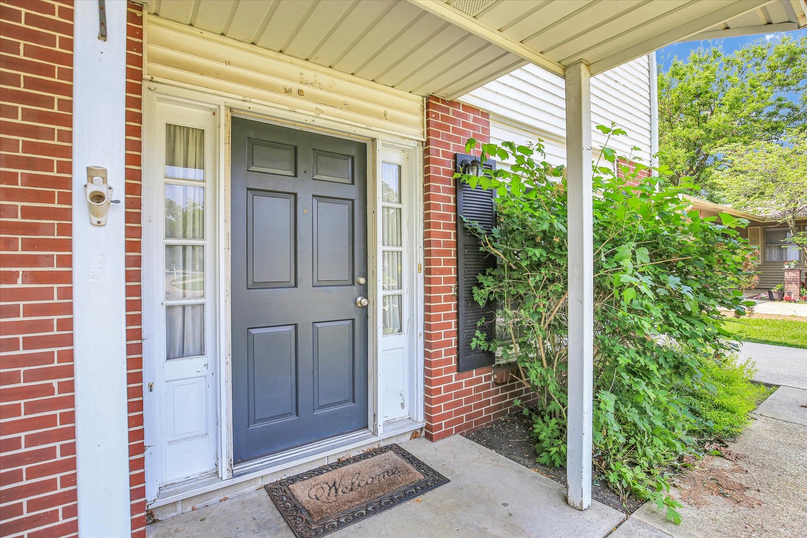 2107 Barberry Drive Champaign, IL 61821 - Photo 10 of 37 a view of front door and porch