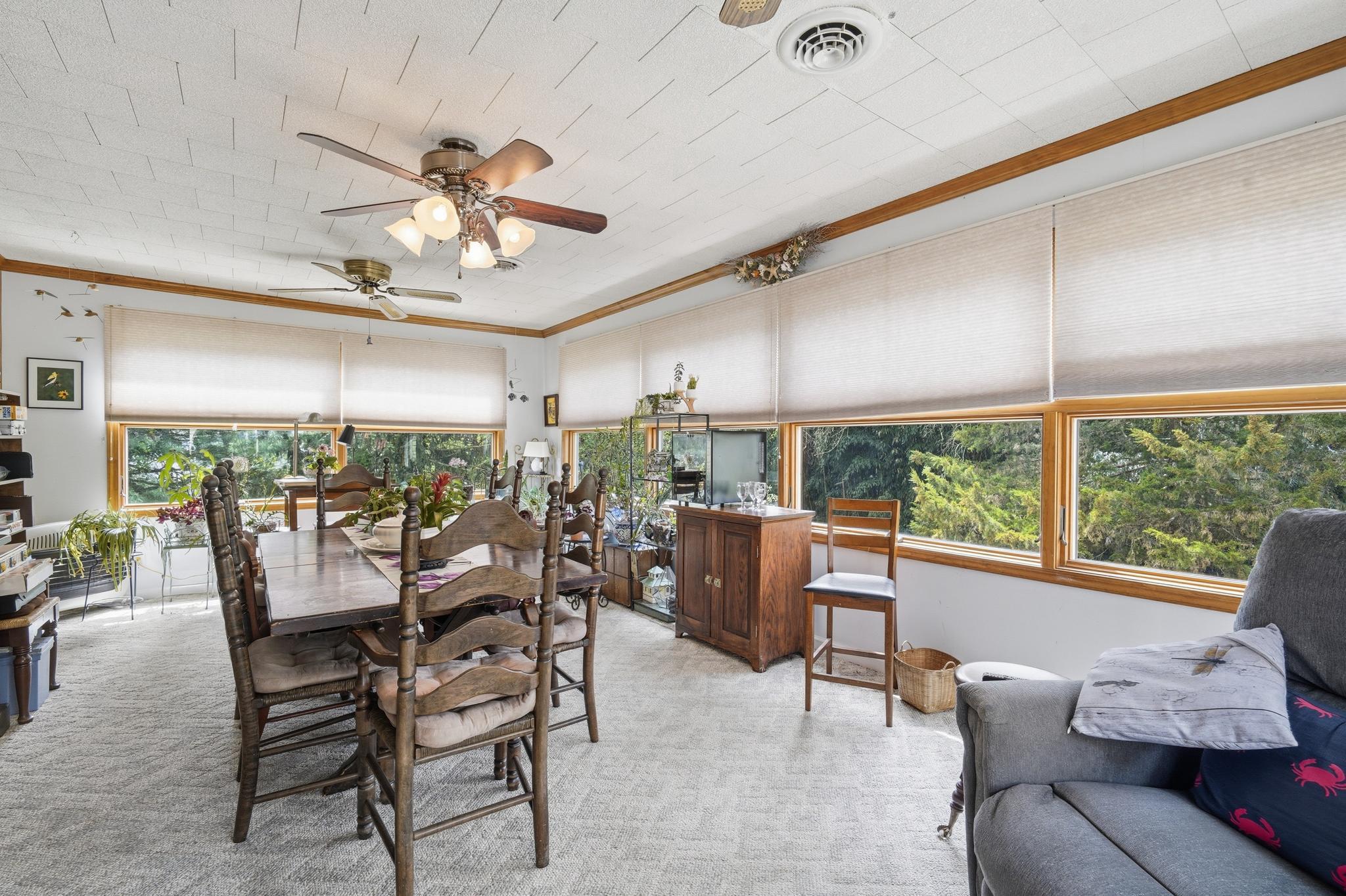 14136 Kentmore Park Road Kennedyville, MD 21645 - Photo 21 of 54 a dining room with furniture window and outside view