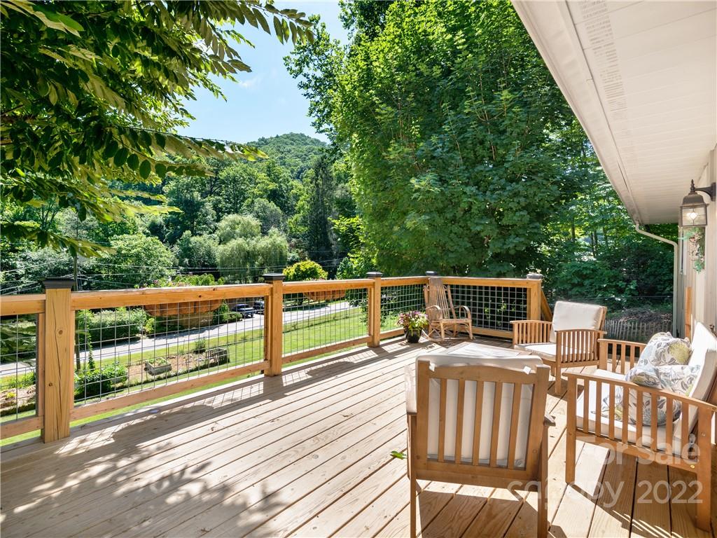 1908 Kims Cove Road Canton, NC 28716 - Photo 11 of 31 a view of balcony with chairs