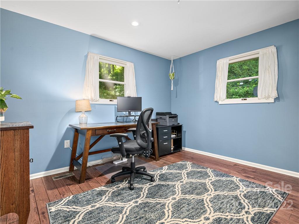 1908 Kims Cove Road Canton, NC 28716 - Photo 17 of 31 a workspace with furniture and a window