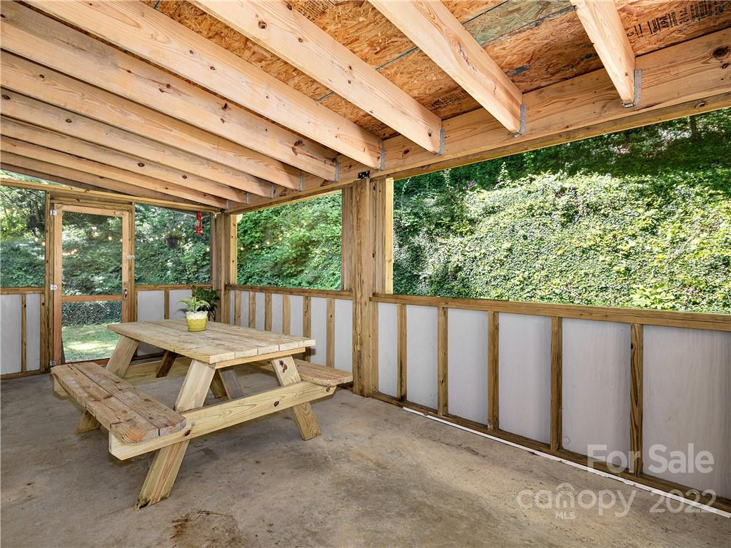 1908 Kims Cove Road Canton, NC 28716 - Photo 21 of 31 a building outdoor space with seating
