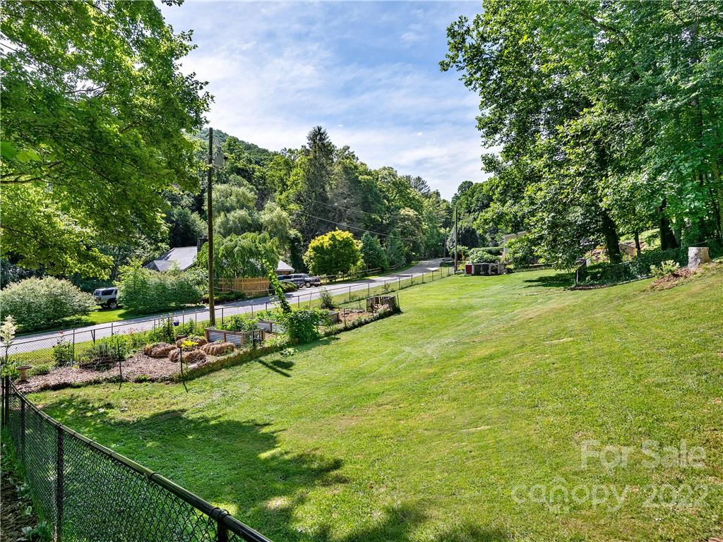 1908 Kims Cove Road Canton, NC 28716 - Photo 23 of 31 a view of a golf course with a park