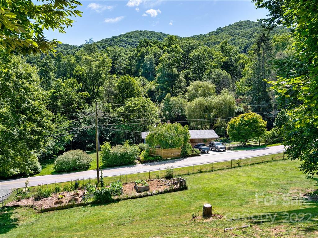 1908 Kims Cove Road Canton, NC 28716 - Photo 24 of 31 a view of a house with a yard
