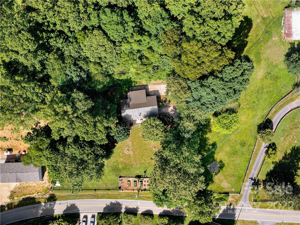 1908 Kims Cove Road Canton, NC 28716 - Photo 31 of 31 an aerial view of a house with a yard