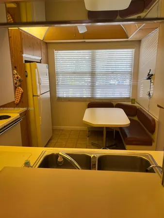 a bathroom with a sink and a shower