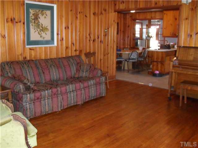 1612 Sherron Road Durham, NC 27703 - Photo 2 of 14 Beautiful hardwood floors in this very large livingroom.