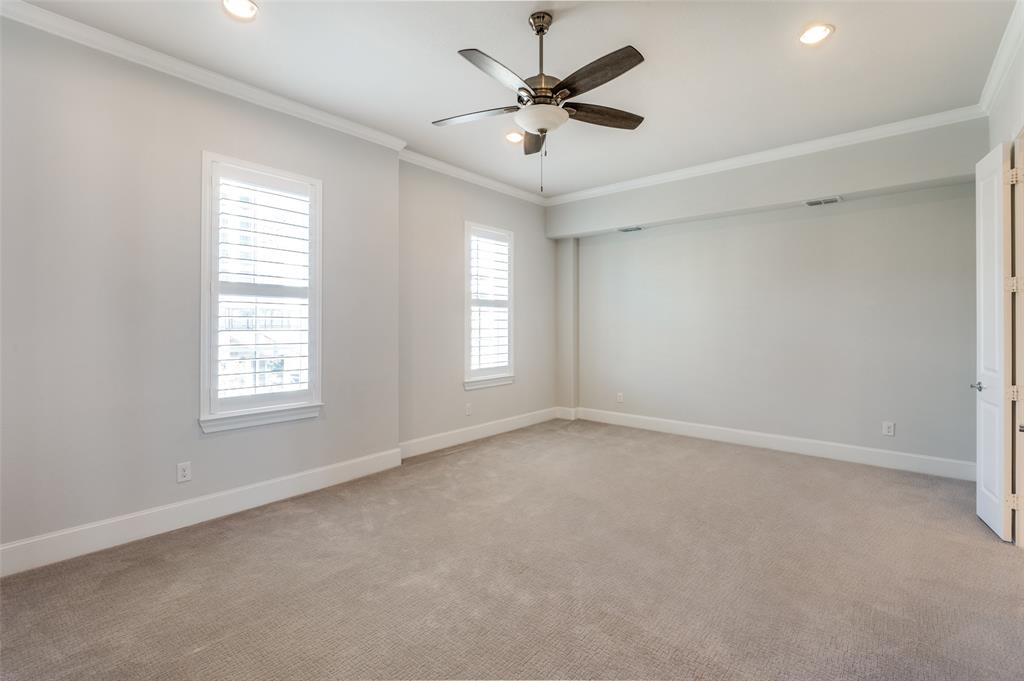5421 Patterson Street Irving, TX 75039 - Photo 14 of 32 Spacious room featuring neutral carpeting and light-toned walls