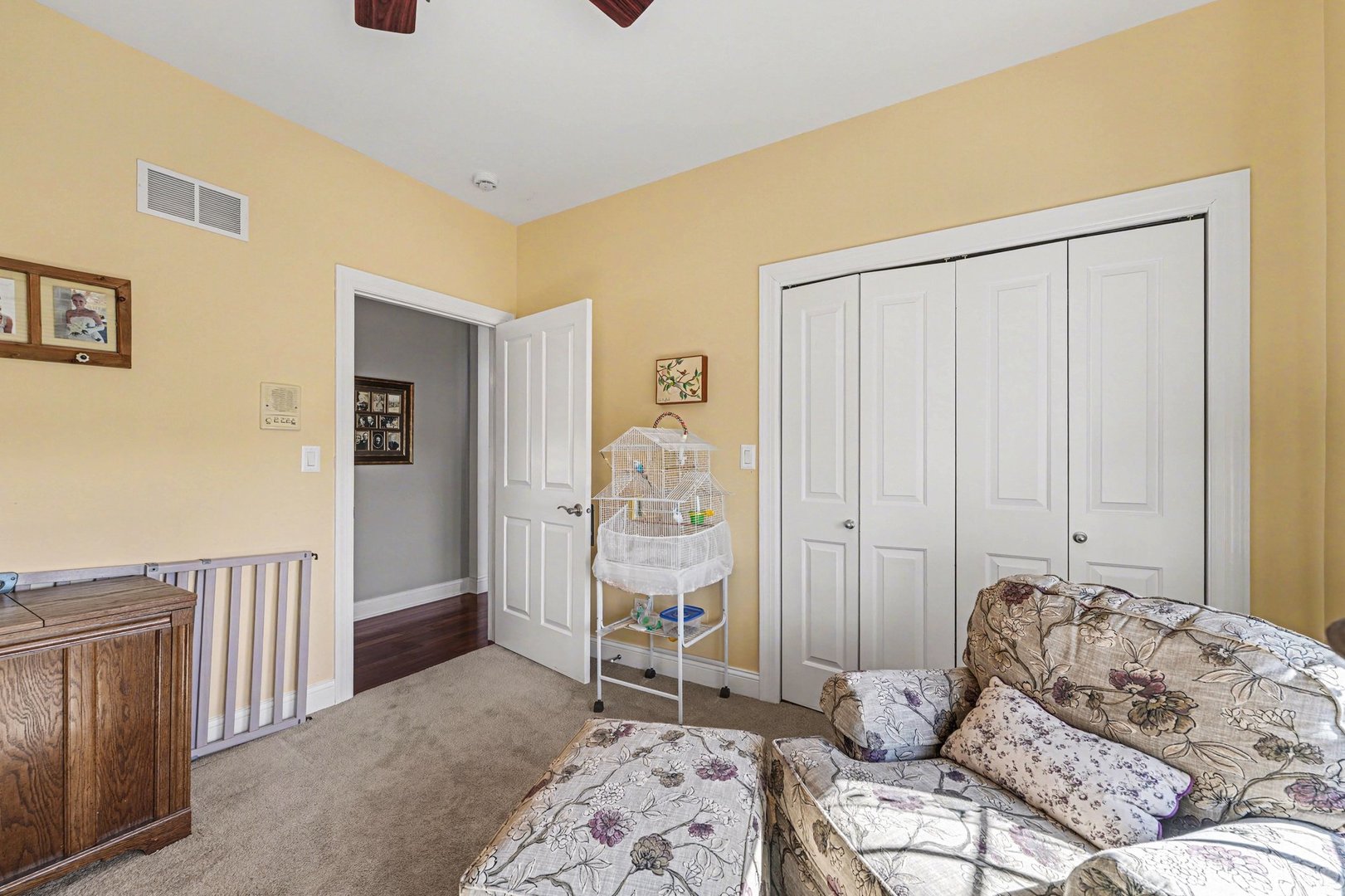 1744 East Offner Road Beecher, IL 60401 - Photo 26 of 49 a bedroom with a bed and a chair