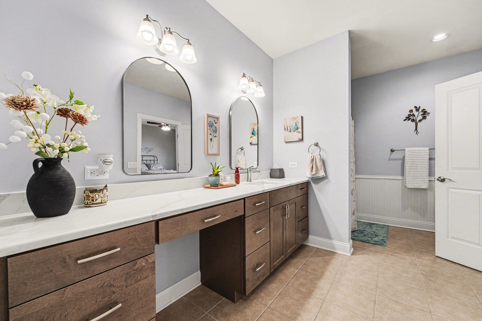 1744 East Offner Road Beecher, IL 60401 - Photo 29 of 49 a bathroom with a double vanity sink and a mirror