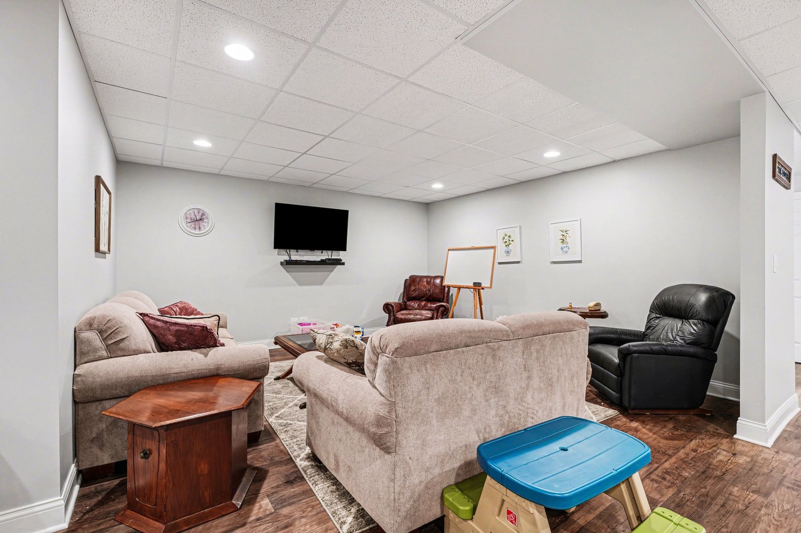 1744 East Offner Road Beecher, IL 60401 - Photo 38 of 49 a living room with furniture and a flat screen tv