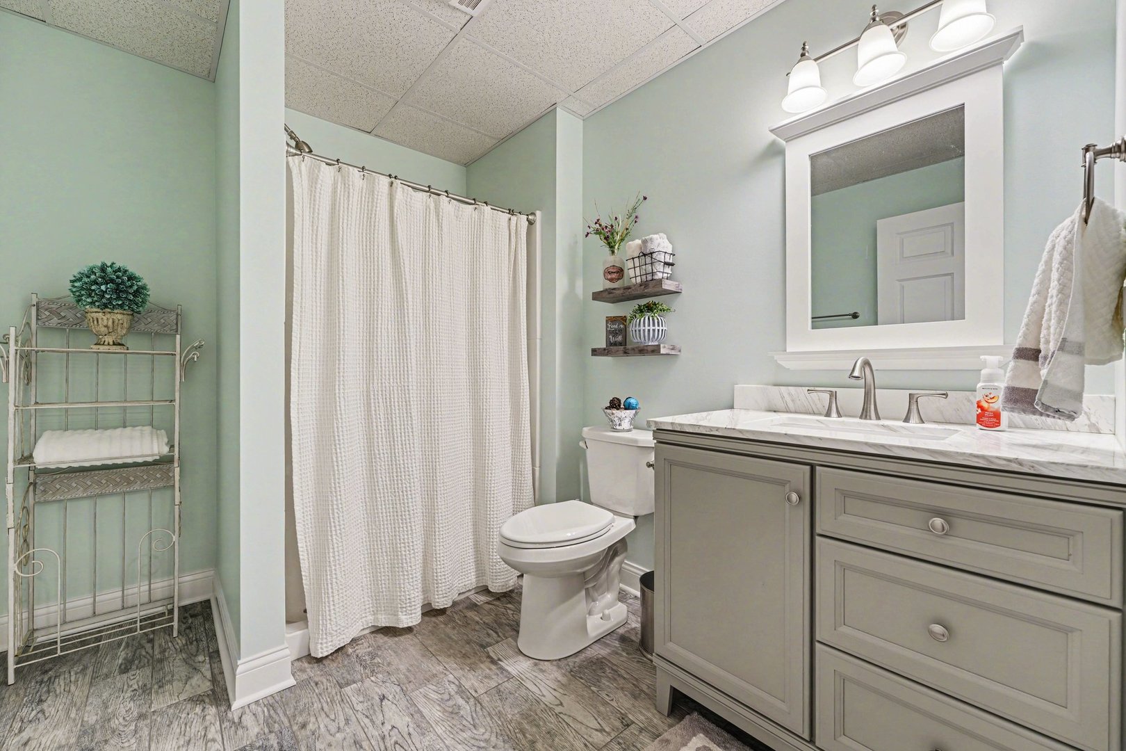 1744 East Offner Road Beecher, IL 60401 - Photo 40 of 49 a bathroom with a toilet sink and mirror