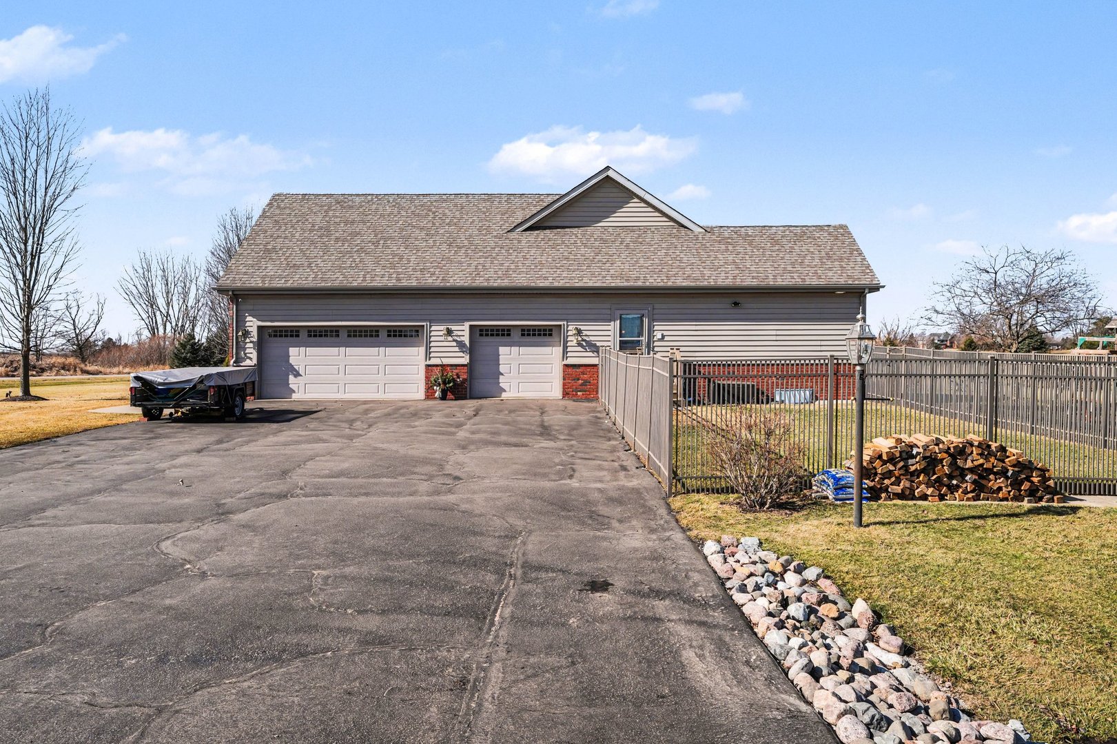 1744 East Offner Road Beecher, IL 60401 - Photo 47 of 49 a front view of a house with garden