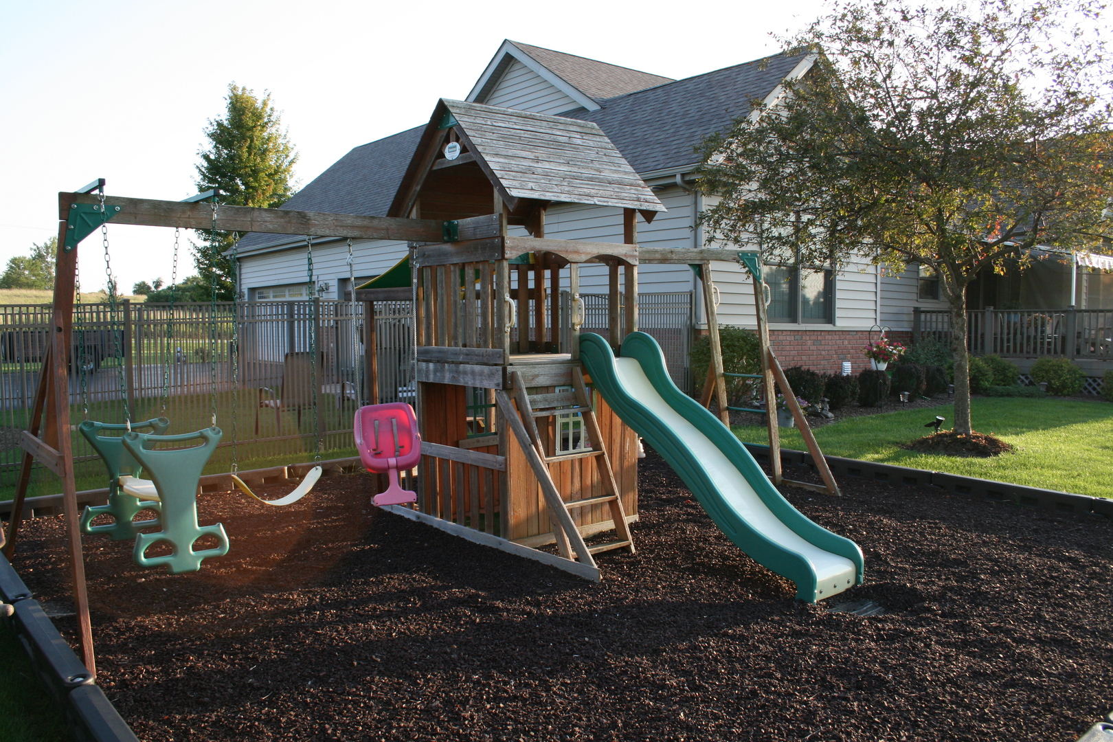 1744 East Offner Road Beecher, IL 60401 - Photo 49 of 49 a view of a wooden deck with a slide