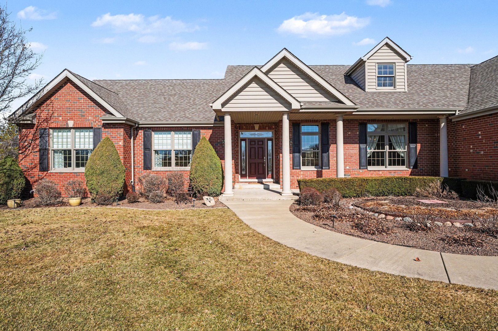 1744 East Offner Road Beecher, IL 60401 - Photo 7 of 49 a front view of a house with garden