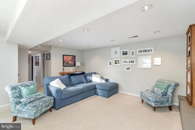 a living room with furniture and a couch