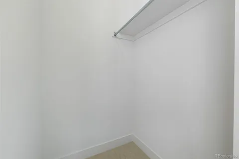 a small space with a white wall