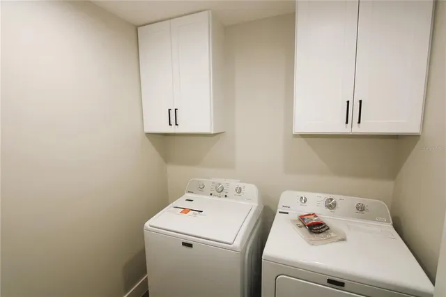 a view of an house with backyard space and garden