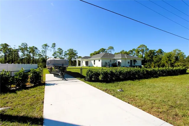a view of a room with air conditioner duct and materials on floor