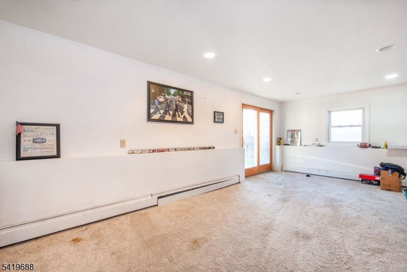 127 Horseneck Road Fairfield, NJ 07004 - Photo 20 of 34 a view of an empty room with a window