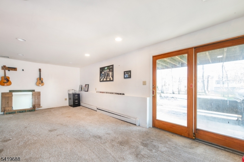 127 Horseneck Road Fairfield, NJ 07004 - Photo 21 of 34 a view of an empty room with a window