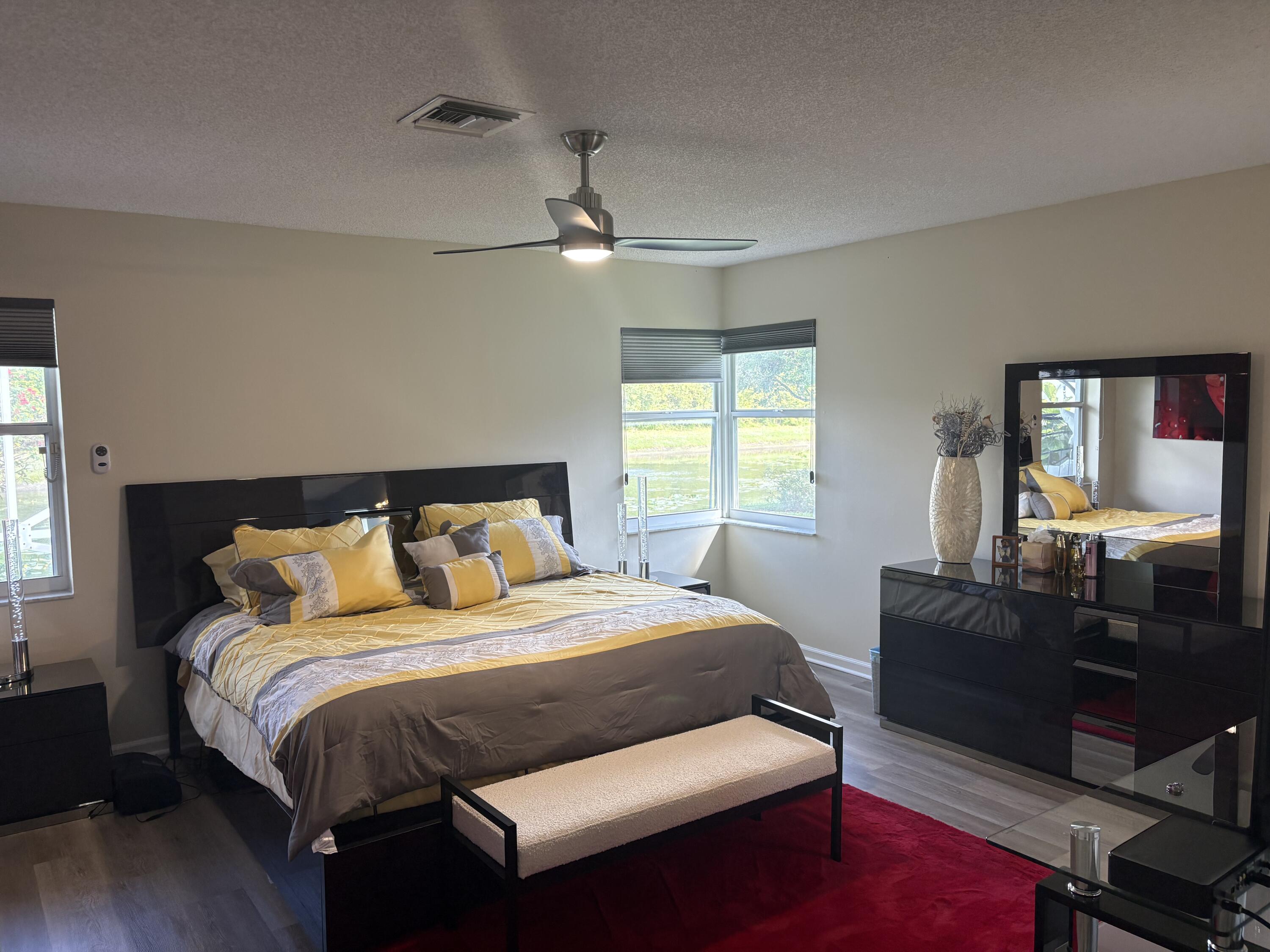 7275 Summer Tree Drive Boynton Beach, FL 33437 - Photo 18 of 28 Primary Bedroom