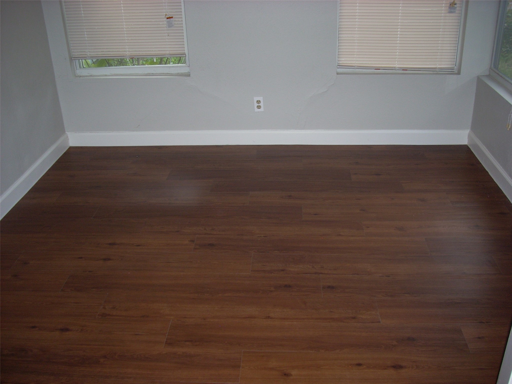 6927 Keller Street Houston, TX 77087 - Photo 7 of 11 a view of a room with wooden floor
