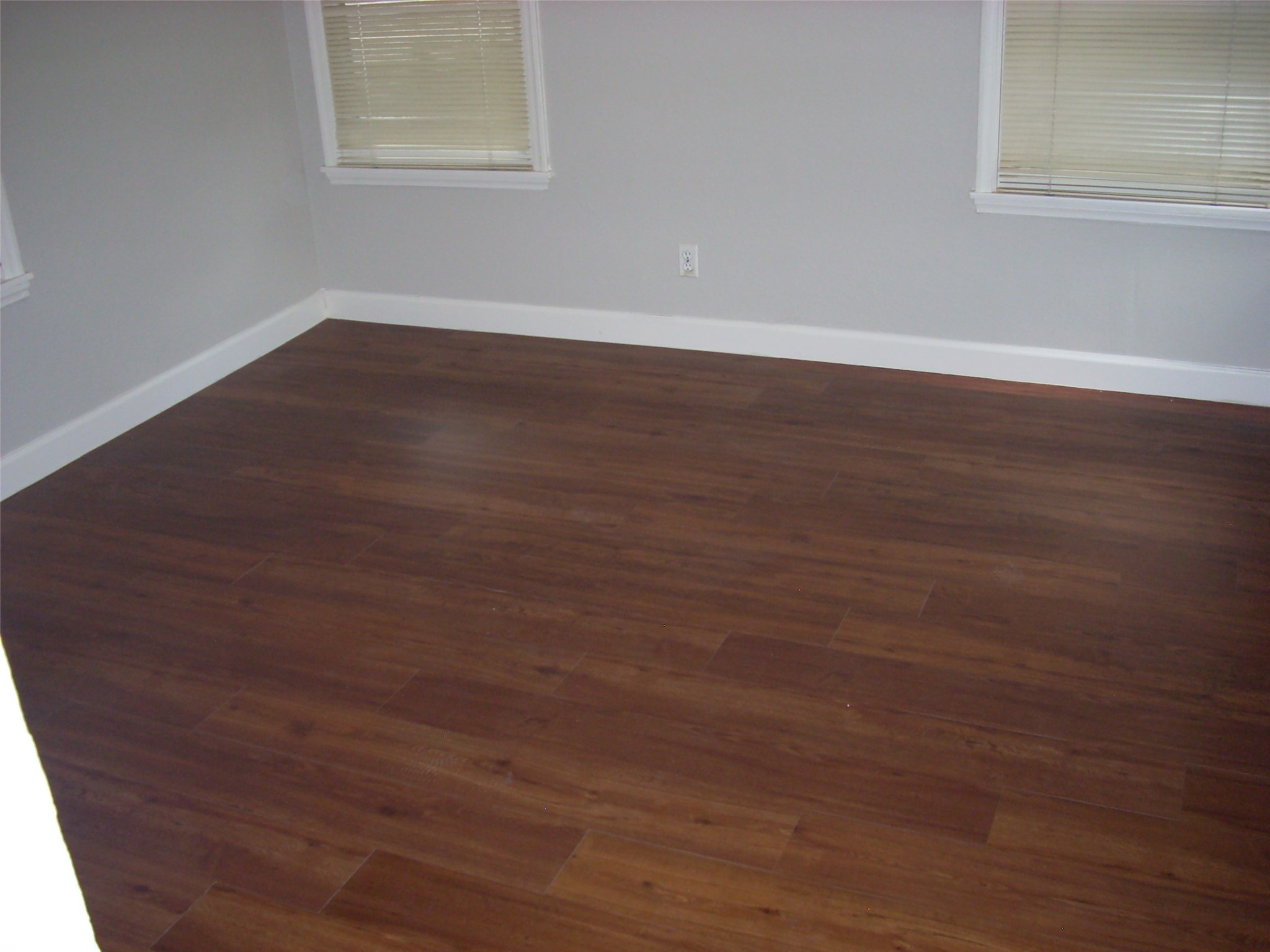 6927 Keller Street Houston, TX 77087 - Photo 8 of 11 a view of a room with wooden floor and window