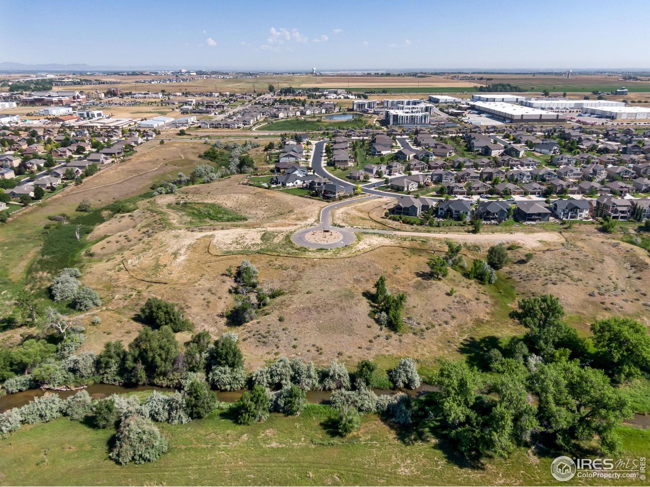 4229 Luchello Court Johnstown, CO 80534 - Photo 20 of 20 an aerial view of residential houses with outdoor space
