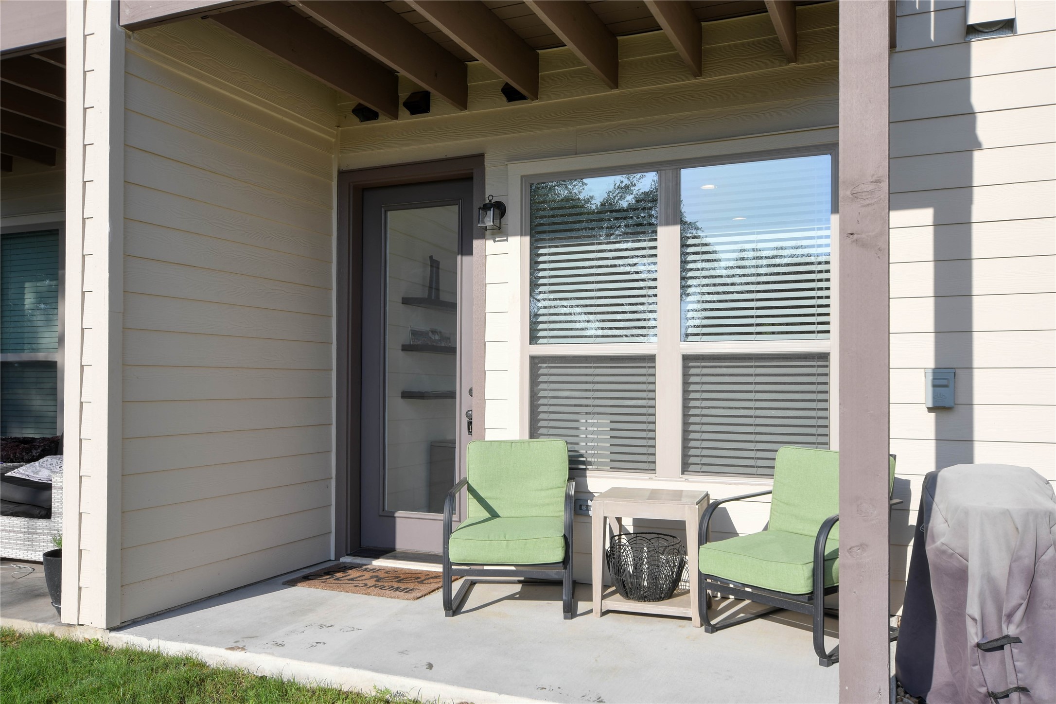 565 Demarett Drive Point Venture, TX 78645 - Photo 17 of 46 a view of a chair and table in the patio