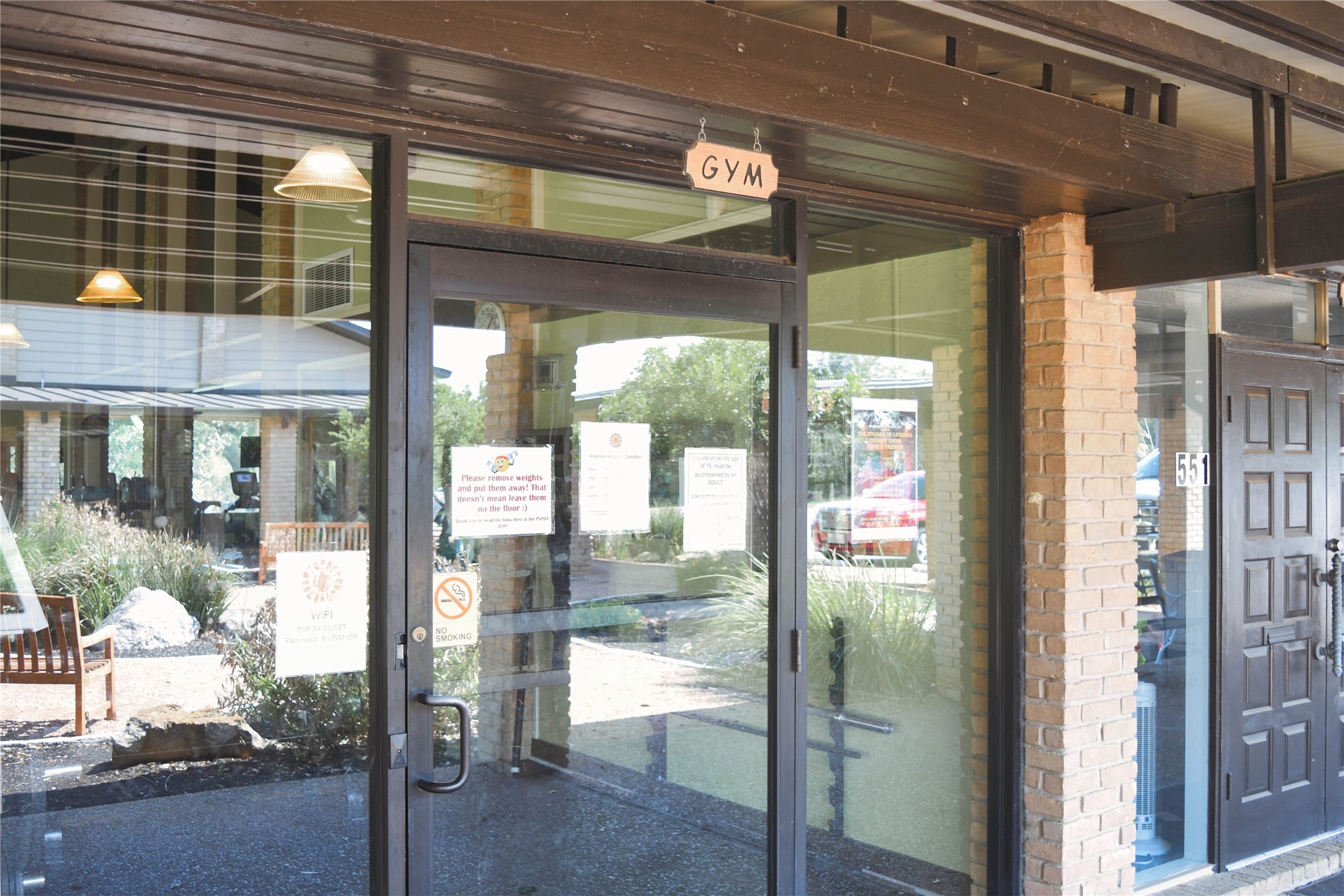 565 Demarett Drive Point Venture, TX 78645 - Photo 21 of 46 a view of a glass door and an outdoor space