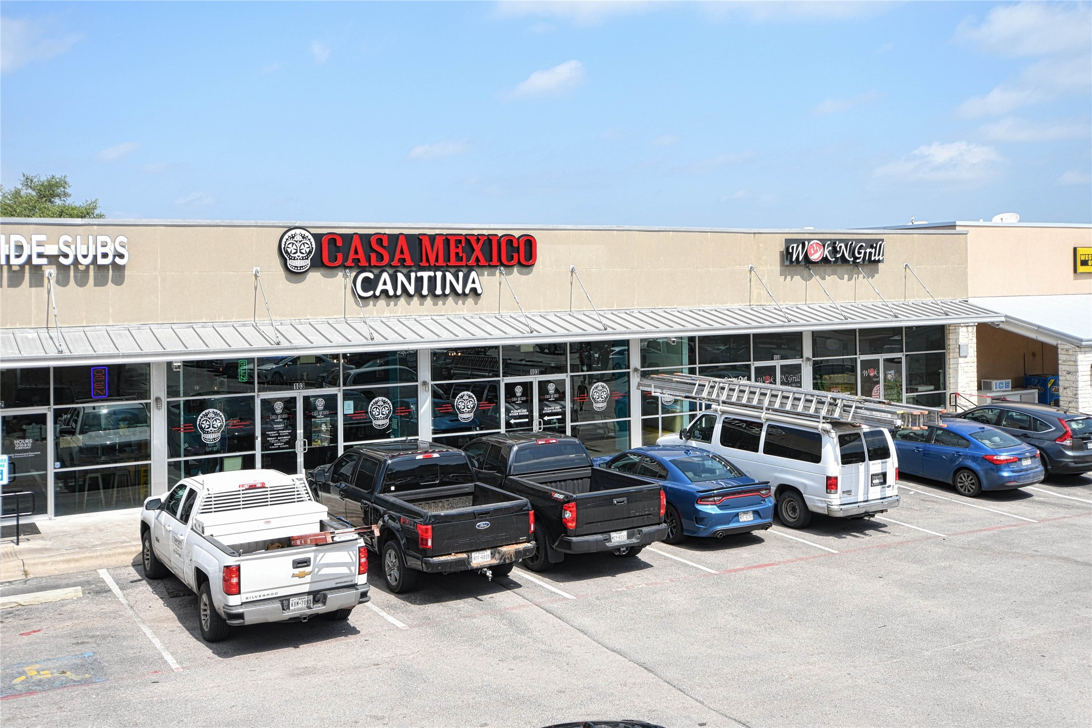565 Demarett Drive Point Venture, TX 78645 - Photo 42 of 46 a car parked in front of a building