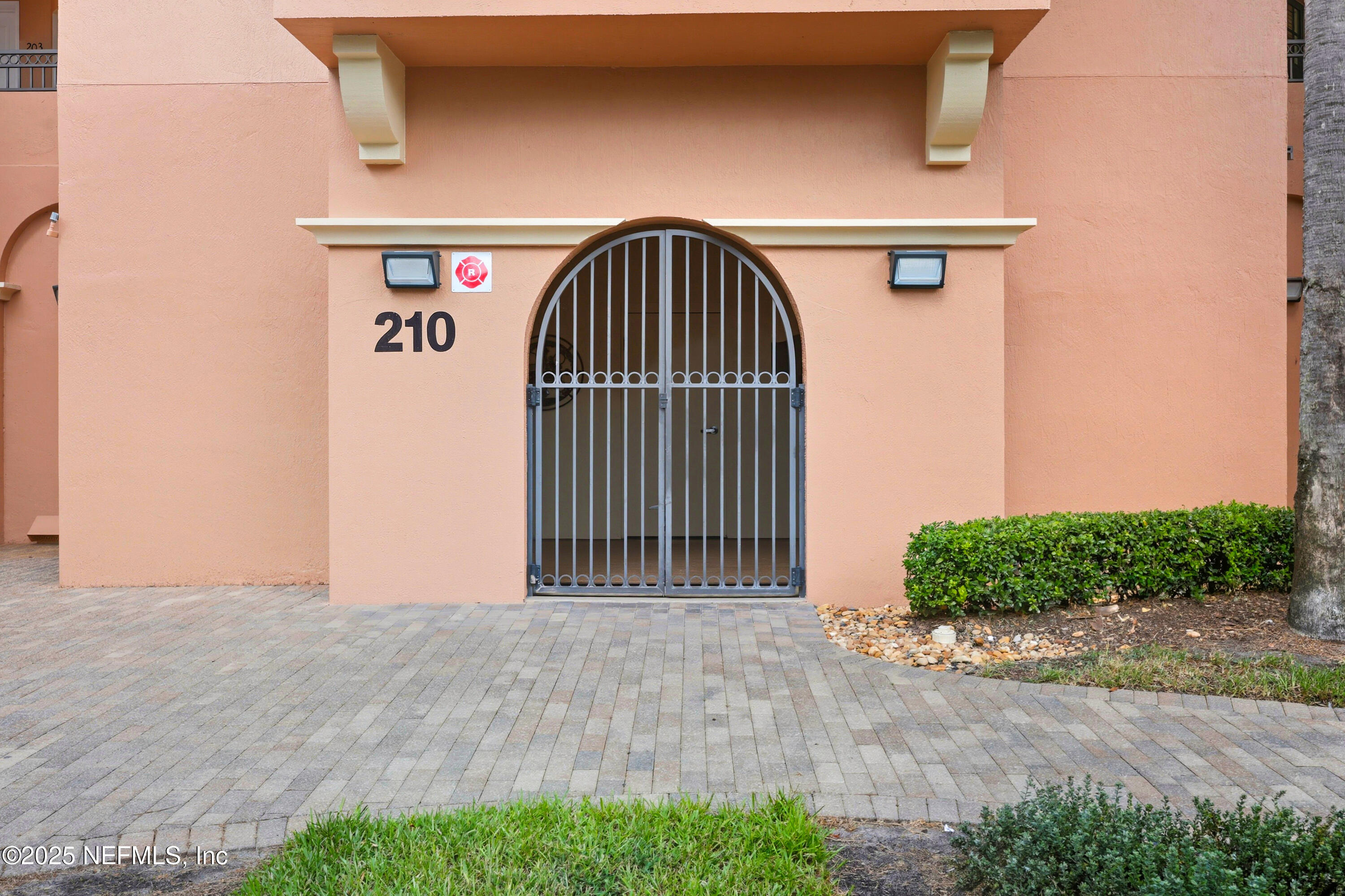 210 Paseo Terraza, Unit 301 St. Augustine, FL 32095 - Photo 4 of 54 a view of entryway with wooden floor