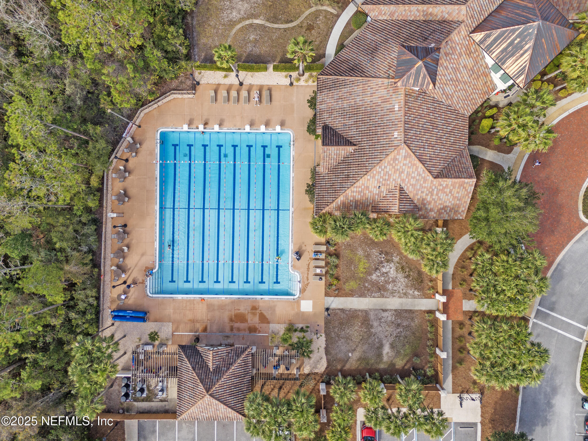 210 Paseo Terraza, Unit 301 St. Augustine, FL 32095 - Photo 45 of 54 an aerial view of a house with a yard