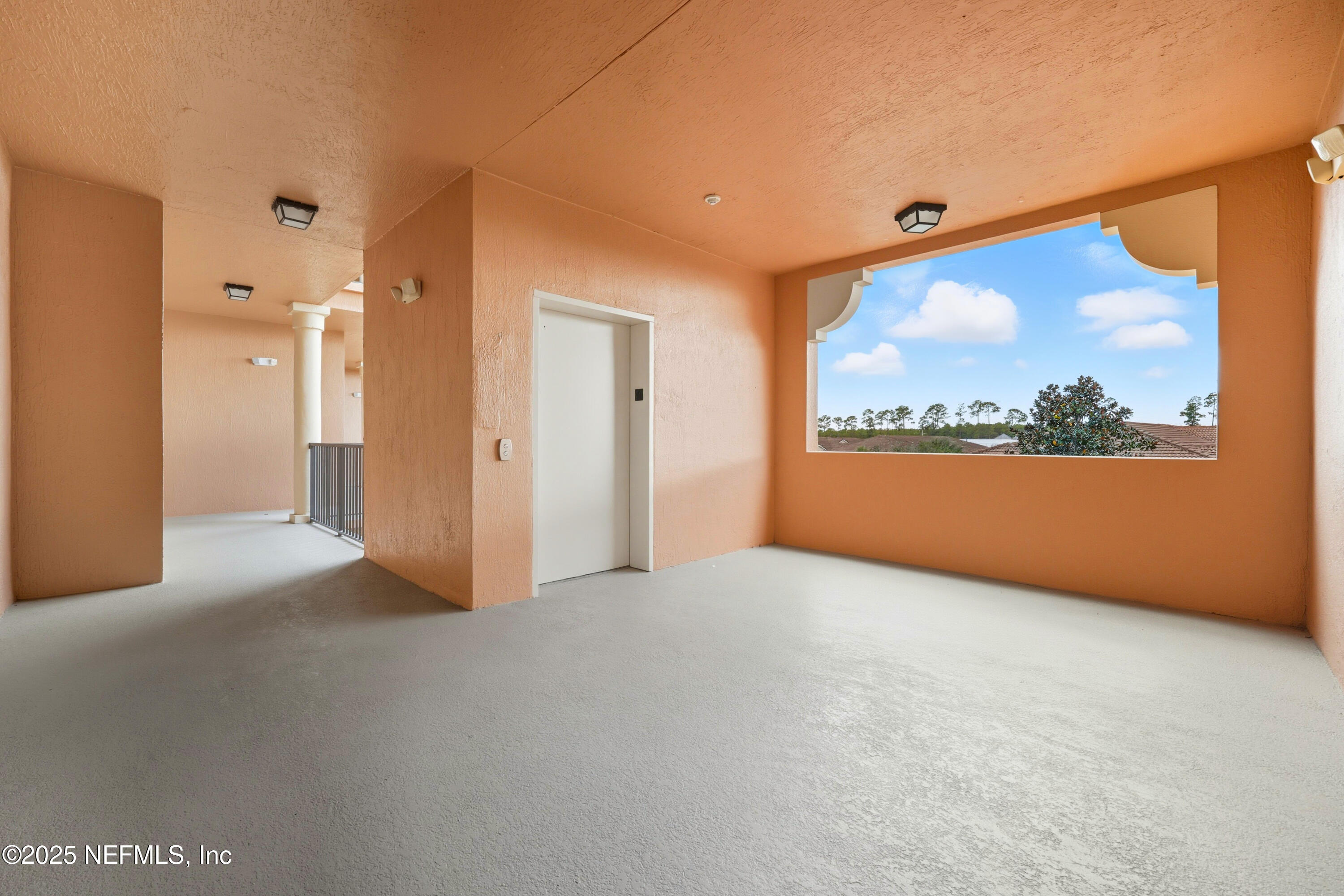 210 Paseo Terraza, Unit 301 St. Augustine, FL 32095 - Photo 6 of 54 a view of an empty room with a window
