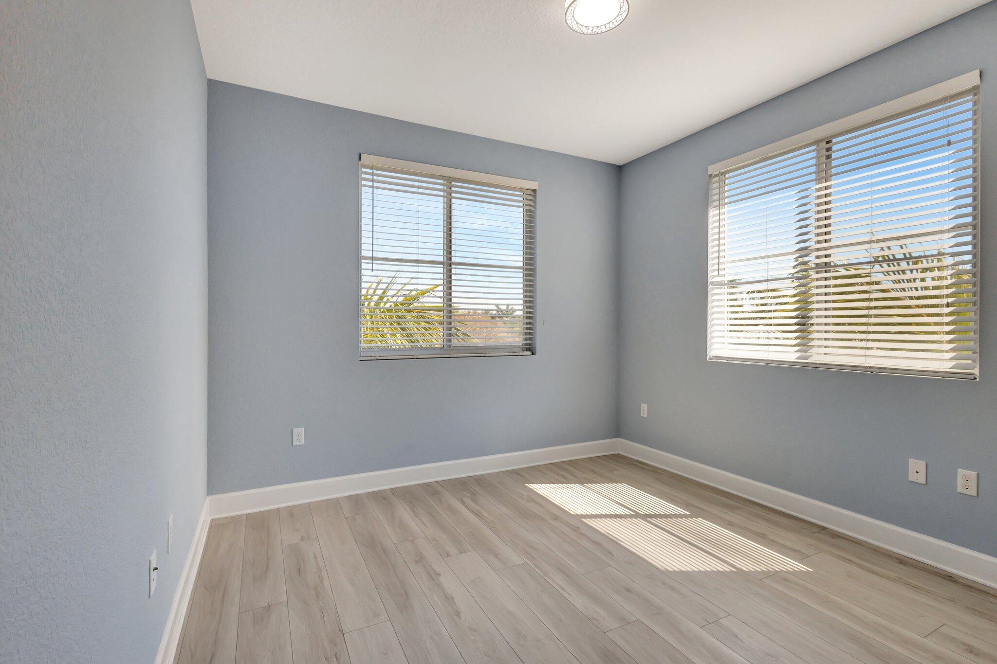 1690 Renaissance Commons Boulevard, Unit 1401 Boynton Beach, FL 33426 - Photo 23 of 41 an empty room with a window