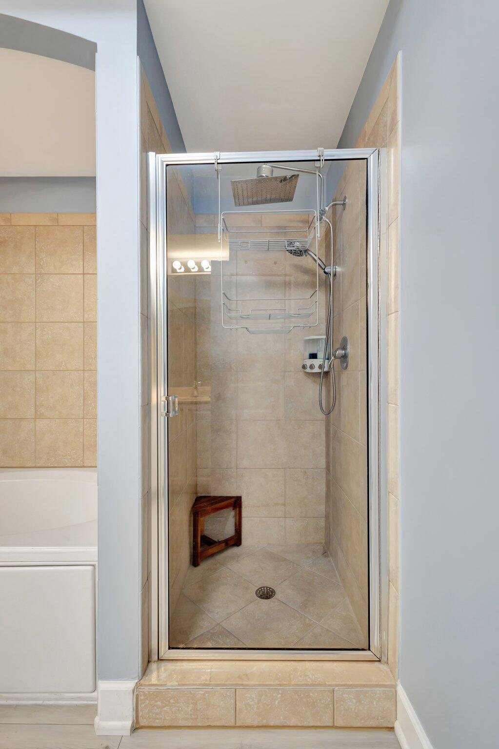 1690 Renaissance Commons Boulevard, Unit 1401 Boynton Beach, FL 33426 - Photo 26 of 41 a bathroom with a shower