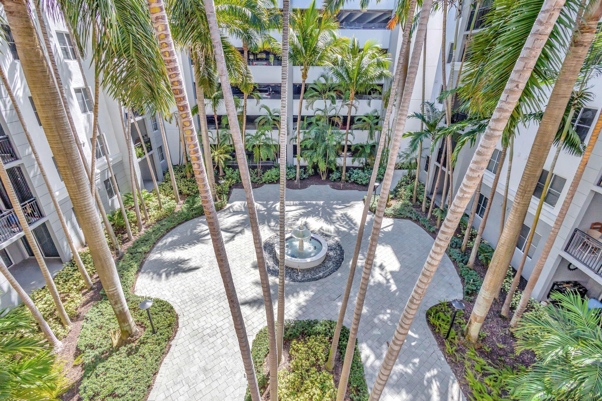 1690 Renaissance Commons Boulevard, Unit 1401 Boynton Beach, FL 33426 - Photo 36 of 41 a view of balcony with plants