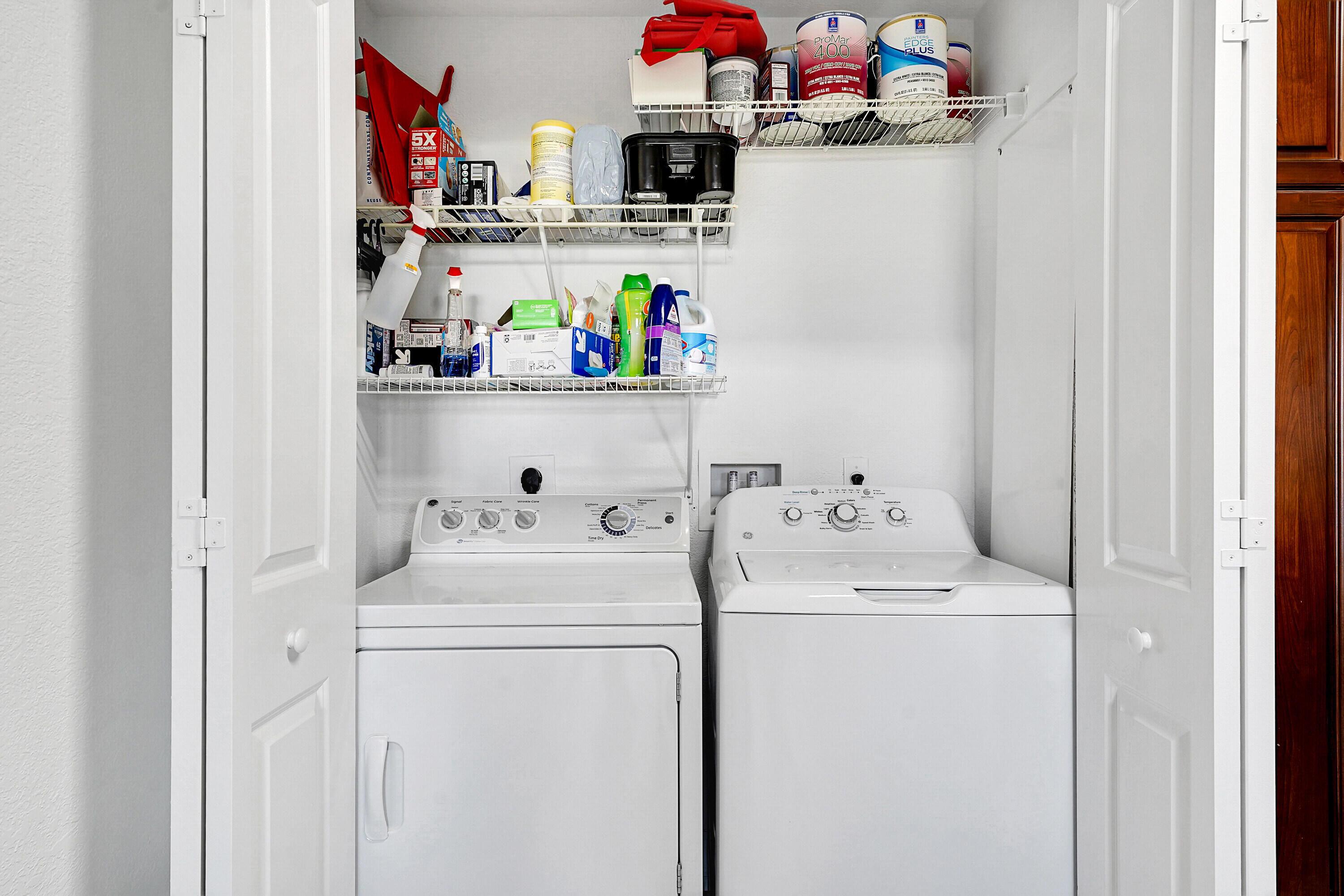 1690 Renaissance Commons Boulevard, Unit 1401 Boynton Beach, FL 33426 - Photo 10 of 41 a utility room with dryer and washer