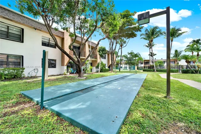 a view of a house with big yard