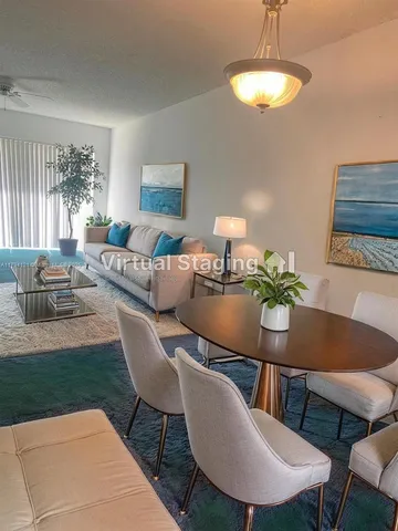 a view of a dining room with furniture