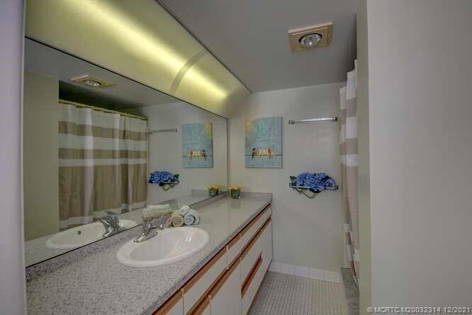 1950 Southwest Palm City Road, Unit 13303 Stuart, FL 34994 - Photo 24 of 34 Master bathroom.