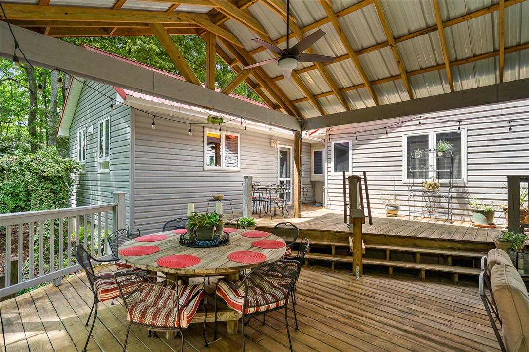 324 Hobson Road Anderson, SC 29621 - Photo 35 of 46 This spacious deck, complete with a covered area, offers an ideal setting for outdoor gatherings and relaxation.
