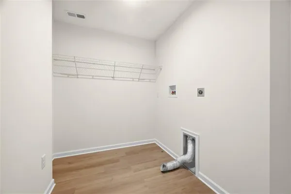 a view of a room with racks on the wall