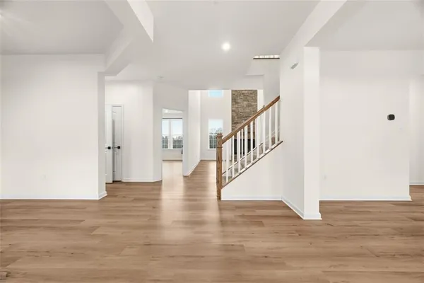a view of entryway with wooden floor